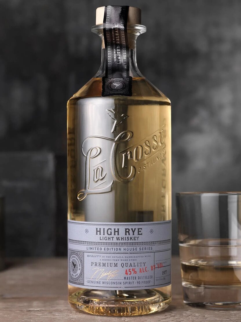 A La Crosse Distilling Co. High Rye bottle beside a poured glass